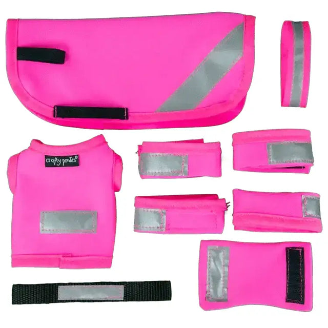 Bright pink crafty ponies hi viz sets with reflective strips including saddle pad vest and wristbands for safety use