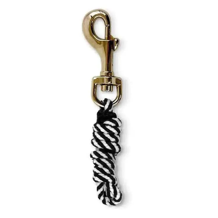 A black and white braided rope keychain with gold-toned metal clasp from crafty ponies lead ropes collection