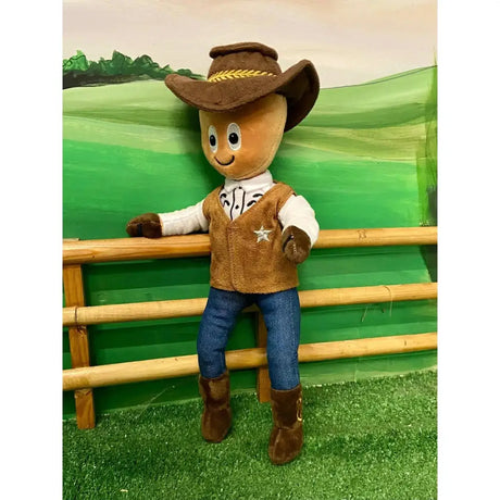 Brown cowboy-themed plush doll with hat vest star emblem and blue jeans from crafty ponies riders clint the cowboy