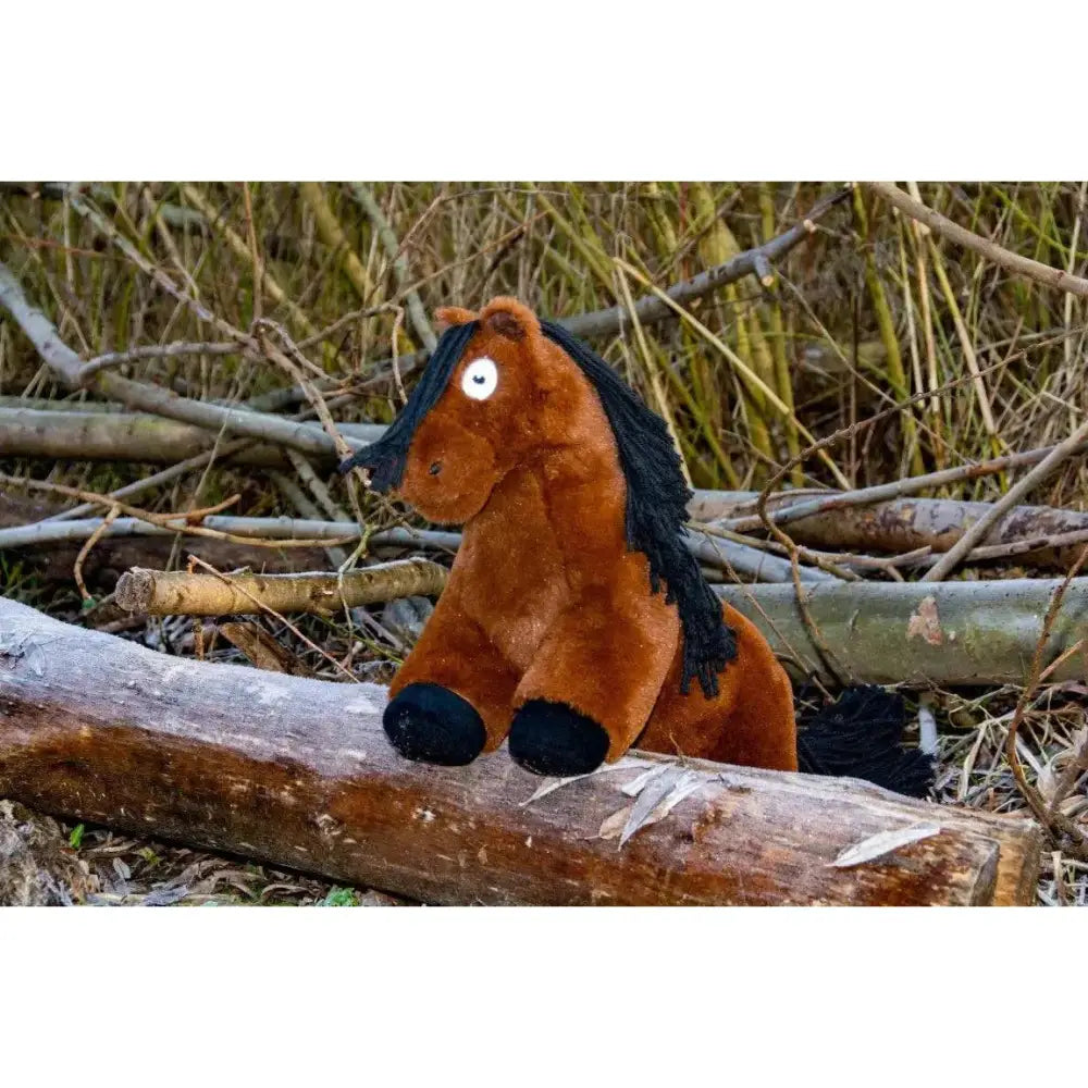 Crafty ponies soft toy pony bay features a plush brown toy pony with black mane hooves and a white circular eye