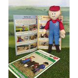 A plush toy of verity vet from crafty ponies stable wearing a red cap blue overalls and black boots smiling
