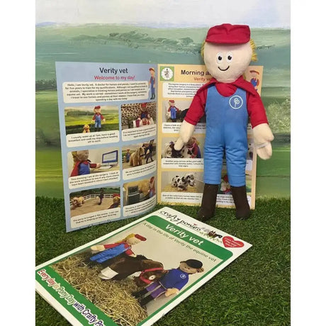 A plush toy of verity vet from crafty ponies stable wearing a red cap blue overalls and black boots smiling