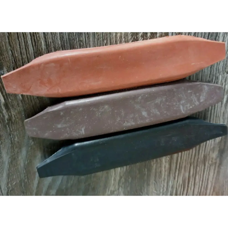 Three boat-shaped soap bars in peach, gray, and navy for Curb Chain Guards Windsor Rubber