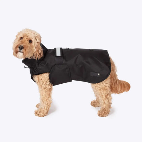 Black waterproof dog coat with reflective strip and adjustable funnel neck velcro straps danish design coat back view