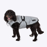 Gray waterproof dog coat with black trim and reflective stripes featuring velcro straps danish design dog coat reflective