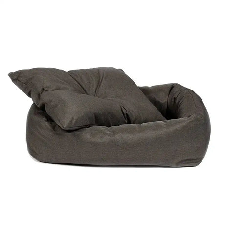 Dark gray plush snuggle bed with matching cushion inside featuring danish design anti-bac for cozy pet comfort