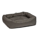 A plush danish design anti-bac snuggle bed green with olive fabric and cushioned raised sides for comfy dogs