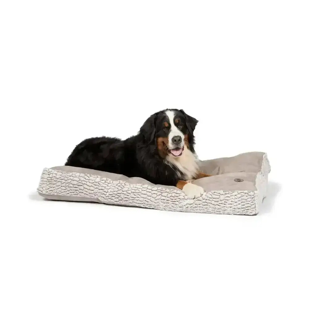 A danish design arctic box duvet dog bed with a textured gray and white outer fabric and soft beige cushion
