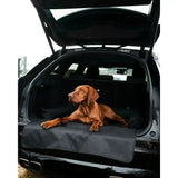 Black waterproof cargo liner in car trunk showing the back side of danish design boot bed dog bed perfect for pets