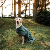 Teal danish design dog robe made of soft towelling fabric with black strap for use as a towelling dog bed