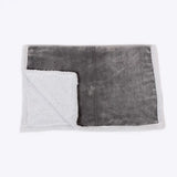 Gray and white danish design essentials fur blanket with soft plush sherpa texture for cozy warmth