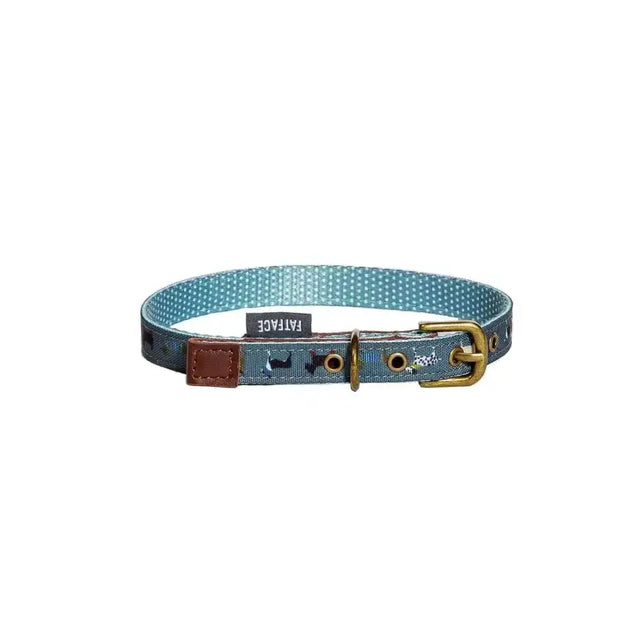A teal danish design fatface marching dogs collar with white polka dots black dog silhouettes and brass buckle