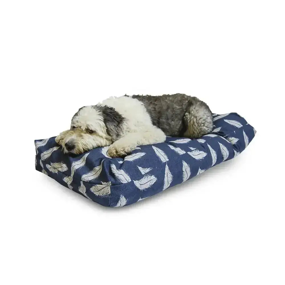 Navy blue danish design feather duvet dog bed with white feather pattern and plush blended memory foam cushioning