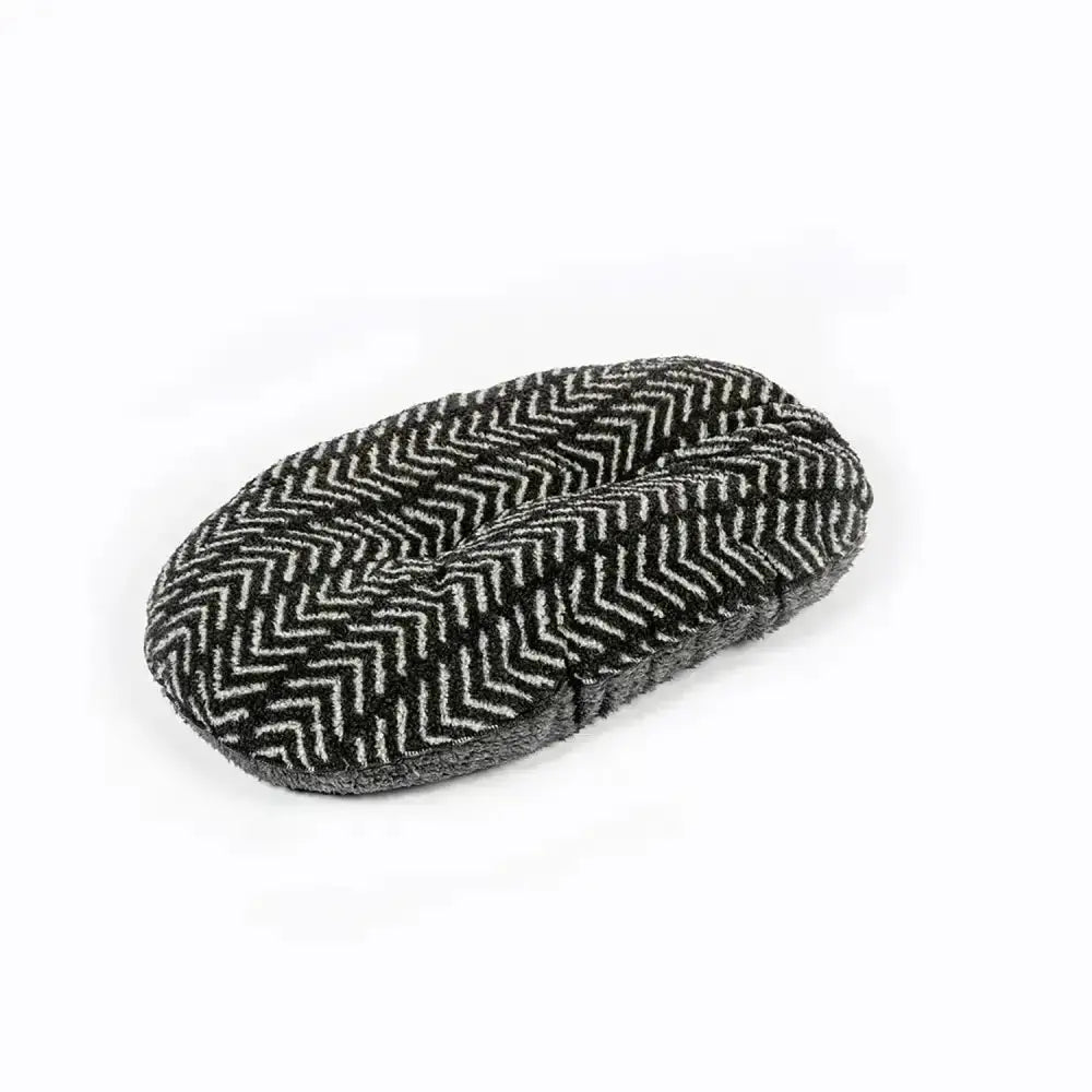 Black and white herringbone-patterned woolen slipper complementing danish design fleece quilted mattress charcoal arrows style