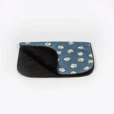 Blue plush danish design harbour paw fleece blanket dog bed with cream paw prints and soft black fleece interior