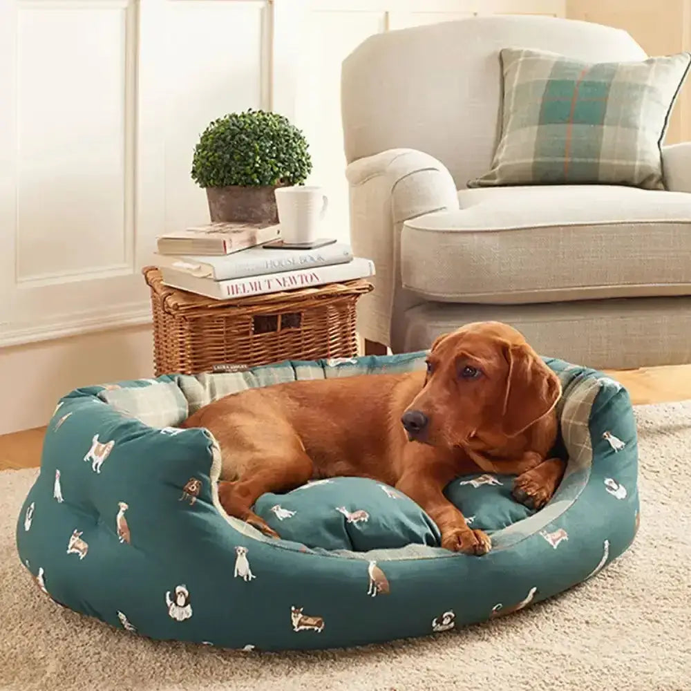 Teal dog bed with soft plush material and playful white and brown dogs pattern in danish design laura ashley park