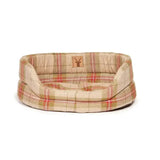 Plaid-patterned dog bed in beige red and green soft fabric by danish design newton perfect for cozy naps