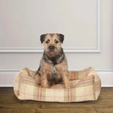 Plaid-patterned danish design newton snuggle bed with beige green and red stripes perfect for cozy dogs