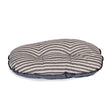 A round cushioned dog bed with soft beige and dark gray rustic stripes quilt fabric top in danish design rustic style