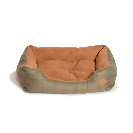 A cozy danish design tweed snuggle bed dog bed with an olive green exterior and soft tan quilted interior