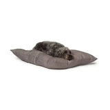 Gray textured danish design vintage dogstooth dog bed with a fluffy gray and black dog resting on a vintage deep duvet cushion