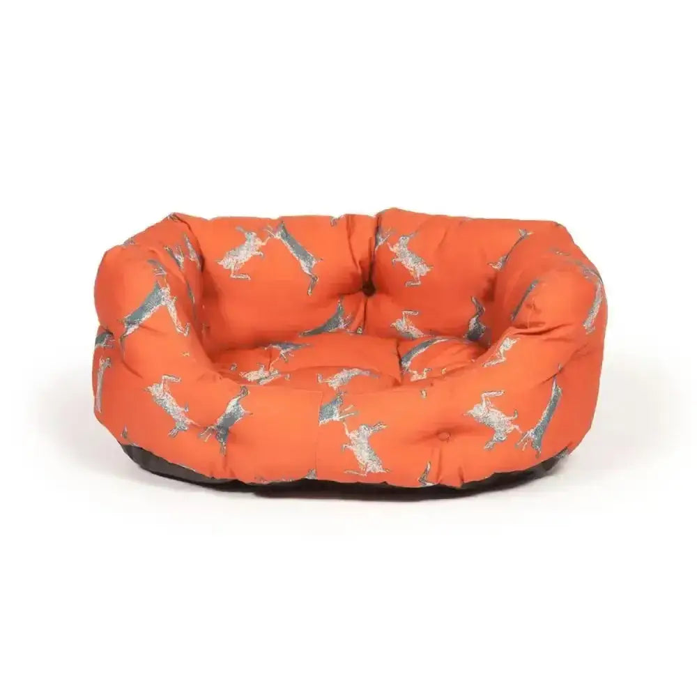 Orange cushioned dog bed with grey and white dachshund pattern from danish design woodland hare deluxe collection