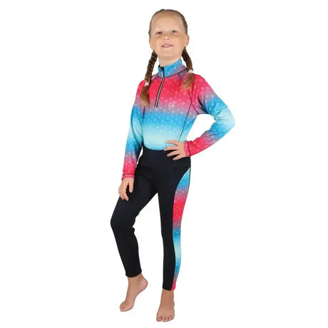 A dazzling diamond riding long-sleeved rash guard with a pink-to-blue cosmic gradient paired with black tights feature magical style