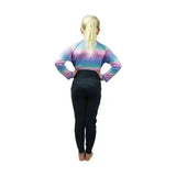 A child wearing the dazzling night base layered funky base layer in iridescent rainbow with flexible fabric
