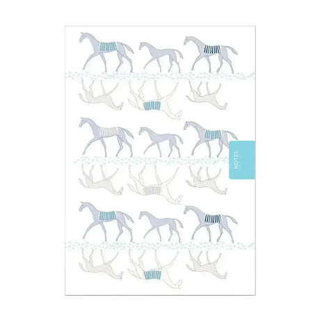 A white deckled edge notebook moody mare with a light gray and teal horse pattern pocket sized notebook