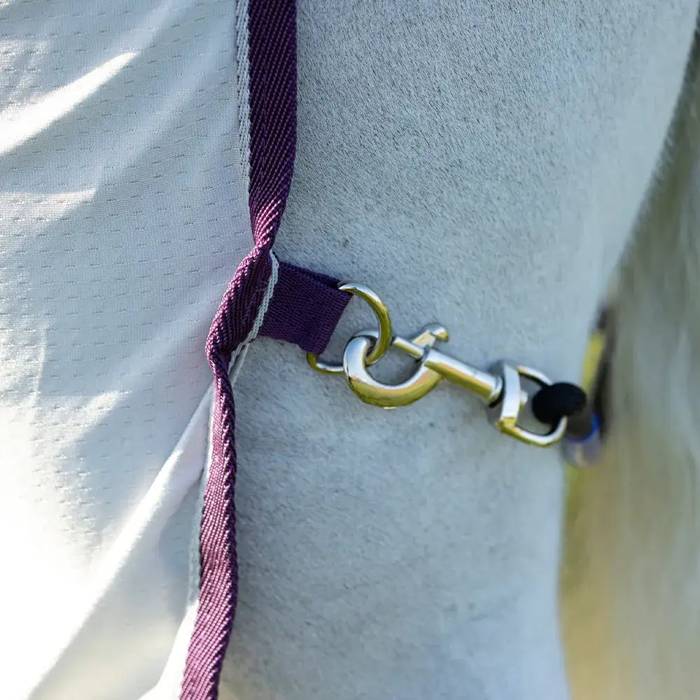 Purple woven strap with metallic buckle on white fabric surface of defencex shield sport air cooler rug