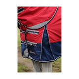 Red and navy blue turnout rug with gray accents and defence logo patch made of durable denier material with detachable neck cover