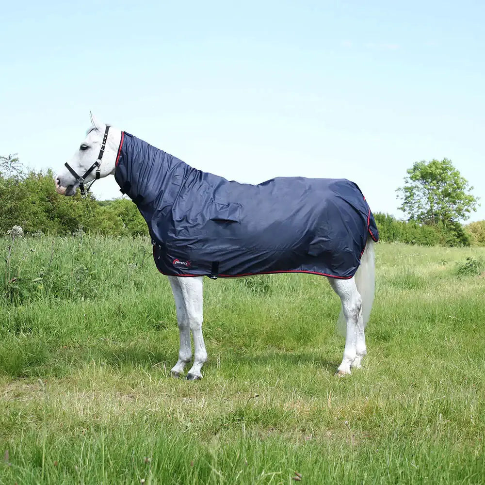 Navy blue waterproof horse blanket with red trim and logo designed for ever-changeable weather rainx protect rug