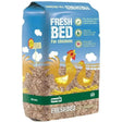 Blue and green packaged dengie fresh bed 100 litre chicken bedding with yellow chickens on straw farm scene promoting british hen welfare trust