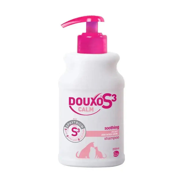 A white plastic bottle with a bright pink pump dispenser of douxo s3 calm calm shampoo for itchy irritated skin