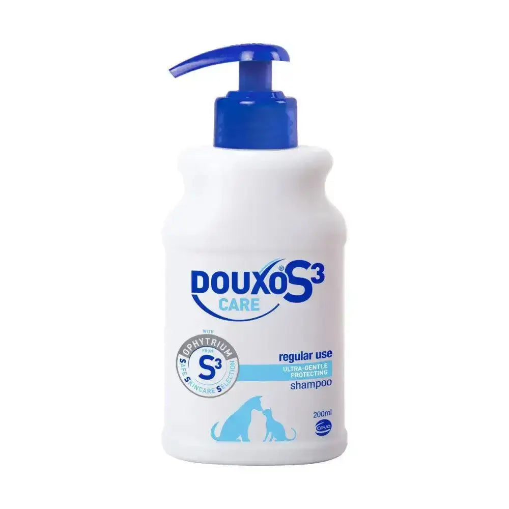 White plastic bottle of douxo s3 care detangling shampoo with blue pump and light blue dog and cat silhouettes for coat soft use