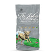 Silver-gray bag of dr john titanium chicken dog food showing daily feeding guide on the back side of the package