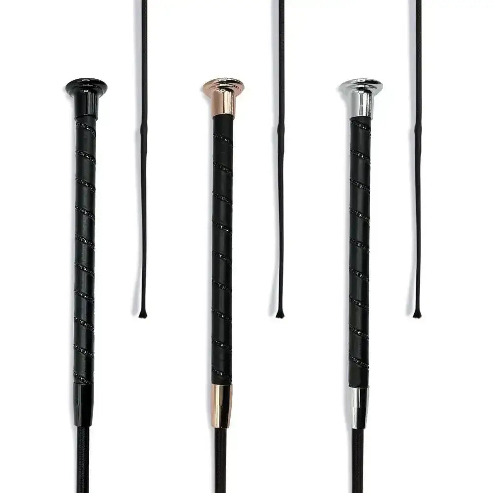 Three black dressage whip black crystal spiral riding crops with textured grips and rose gold silver and chrome caps