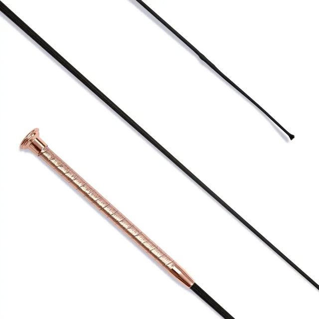 Dressage whip leather with a rose gold cap and textured grip paired with a black leather whip