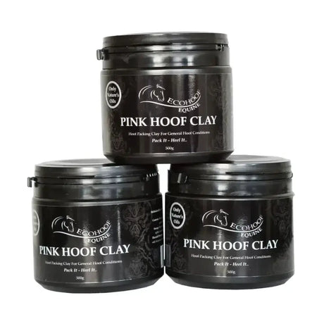 Black cylindrical containers of ecohoof pink hoof clay for treating hoof skin conditions with horse logo and white text labels