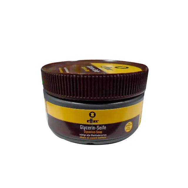 Brown and yellow labeled jar of effax glycerine saddle soap for glycerine saddle and tack care maintenance