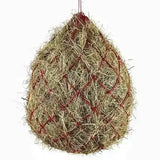 A hanging elico bodmin haynet with larger holes filled with golden brown straw and secured by red mesh pattern
