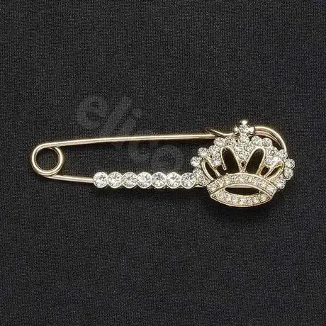 A sparkling silver elico crystal crown stock pin with jeweled crown and clear crystals along its body