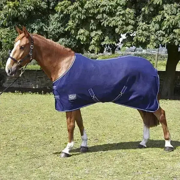A navy blue elico exmoor fleece horse blanket with white trim designed for warmth and comfort fleece rugs elico