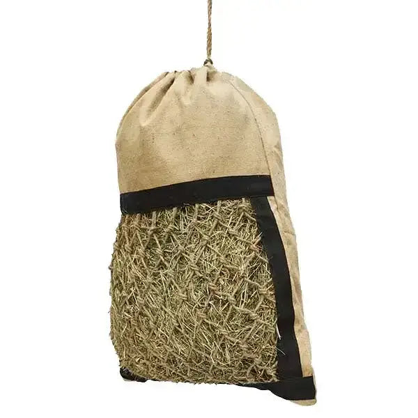 Beige elico hebden jute drawstring haybag with black trim and mesh section filled with golden straw for feeding hay