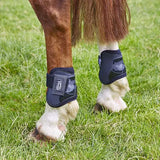 Black elico memory foam fetlock boots with glossy finish and adjustable strap for horse leg protection