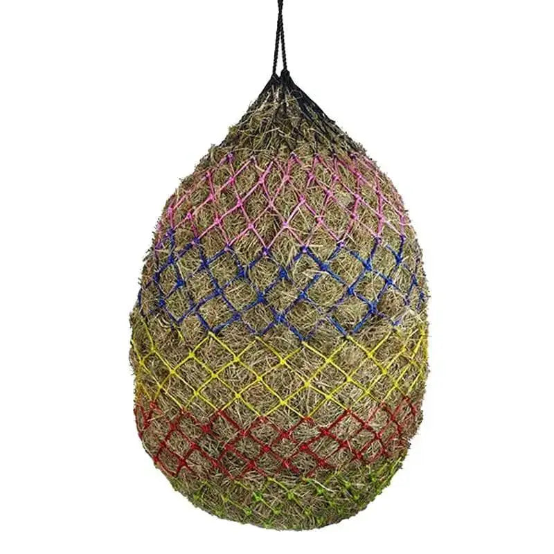 A colorful quirky elico quantock haynet with pink blue yellow and red woven mesh over natural straw