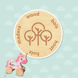 Pink wooden unicorn pull-along toy with star details and round wheels from elico ses push wooden unicorn set