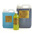 Three elico shampoo tea tree bottles in blue jug, green bottle, and gray container with gold labels visible