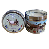 A cylindrical elico soy candle tin with silver rim and colorful horse illustrations for pasture plant based use