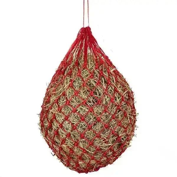 Red woven small sized ives shetland haynet filled with golden brown straw with hanging loop for easy use